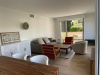 Posedenie v ubytovaní Magnifique appartement climatisé de 87m², à 100m de la plage