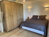 Posteľ alebo postele v izbe v ubytovaní Magnifique appartement climatisé de 87m², à 100m de la plage