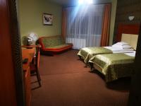 Łóżko lub łóżka w pokoju w obiekcie Hotel i Restauracja Bona