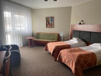 Łóżko lub łóżka w pokoju w obiekcie Hotel i Restauracja Bona