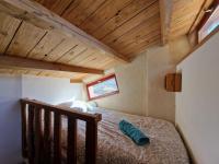 Posteľ alebo postele v izbe v ubytovaní Le salagou sauna