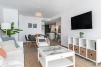 Televízia a/alebo spoločenská miestnosť v ubytovaní Costa Blanca Holiday Rental AltaMar II