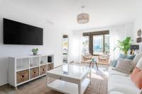 Televízia a/alebo spoločenská miestnosť v ubytovaní Costa Blanca Holiday Rental AltaMar II