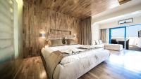 Posteľ alebo postele v izbe v ubytovaní Panorama Village Hotel
