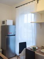 Kuchnia lub aneks kuchenny w obiekcie Pajger Apartman Egyetemváros