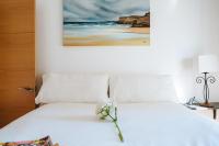 A bed or beds in a room at Distinguido y Céntrico Apartamento en San Bernardo