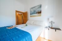 A bed or beds in a room at Distinguido y Céntrico Apartamento en San Bernardo