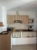 Kuchyň nebo kuchyňský kout v ubytování Apartamentos Buganvilla Roquetas de Mar