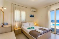 Posteľ alebo postele v izbe v ubytovaní Villa Rami by Villa Plus