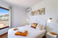 A bed or beds in a room at Villa Maria by Villa Plus