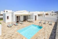 The swimming pool at or close to Villa Muzu by Villa Plus
