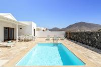 The swimming pool at or close to Villa Muzu by Villa Plus