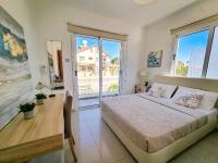 Postel nebo postele na pokoji v ubytování Nissi beach villa Magnolia