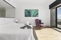 Postel nebo postele na pokoji v ubytování Villa Atlantico - Planta alta