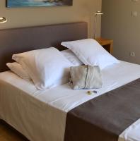 Łóżko lub łóżka w pokoju w obiekcie Chambres d'hôtes Le Pontillaou