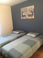 Posteľ alebo postele v izbe v ubytovaní centre Pierrefonds superbe appartement + parking
