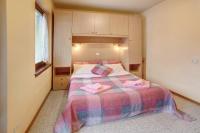 A bed or beds in a room at Monolocale Sole 2