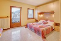 A bed or beds in a room at Monolocale Sole 2