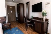 TV a/nebo společenská místnost v ubytování Oławian Hotel