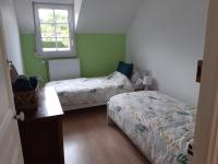 Łóżko lub łóżka w pokoju w obiekcie 14-18 Somme Chambres