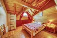 Łóżko lub łóżka w pokoju w obiekcie Chalet l'Hermine