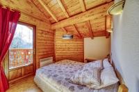 Łóżko lub łóżka w pokoju w obiekcie Chalet l'Hermine
