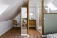 Łóżko lub łóżka w pokoju w obiekcie Le 37 - Maison 2 chambres en bord de mer