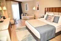 Postel nebo postele na pokoji v ubytování Seaden Quality Resort & Spa Ultra All Inclusive