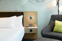 Astra Hotel, Seattle, a Tribute Portfolio Hotel by Marriottにあるベッド