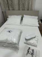 A bed or beds in a room at Le bougainvillea 2