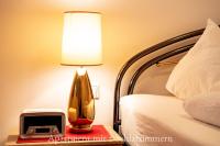 A bed or beds in a room at Astoria Apartments