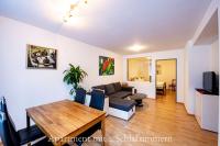 A television and/or entertainment centre at Astoria Apartments