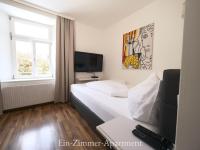 A television and/or entertainment centre at Astoria Apartments