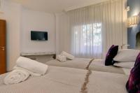 Postel nebo postele na pokoji v ubytování Stunning 2 Bedroom Apartment in Aloha Hill Club