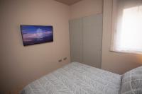 Postel nebo postele na pokoji v ubytování Destino Deluxe Valle del Este Vera