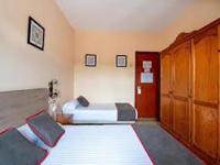 Łóżko lub łóżka w pokoju w obiekcie HOSTAL-RESTAURANTE EL PAISANO