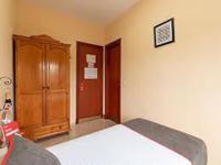 Łóżko lub łóżka w pokoju w obiekcie HOSTAL-RESTAURANTE EL PAISANO