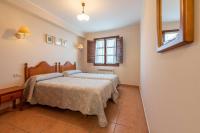 Postel nebo postele na pokoji v ubytování Casa Rural La Indiana I y II