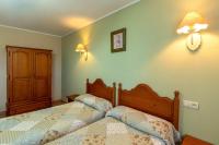 Postel nebo postele na pokoji v ubytování Casa Rural La Indiana I y II
