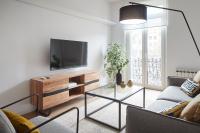 A television and/or entertainment centre at Autonomia - The Rentals Collection