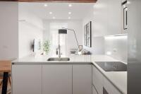 A kitchen or kitchenette at Autonomia - The Rentals Collection