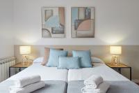 A bed or beds in a room at Autonomia - The Rentals Collection