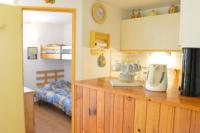 Kuchyňa alebo kuchynka v ubytovaní Charmant appartement à deux pas de la plage