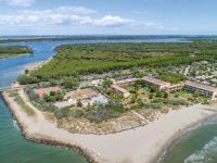 an aerial view of a resort on a beach at SOWELL RESIDENCES Les Sablons in Le Grau-du-Roi