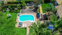 The swimming pool at or close to Cubo's Villa Llanos de la Plata