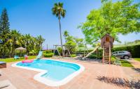 The swimming pool at or close to Cubo's Villa Llanos de la Plata