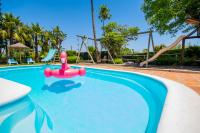 The swimming pool at or close to Cubo's Villa Llanos de la Plata