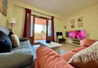 Televízia a/alebo spoločenská miestnosť v ubytovaní Apartamento Saadia Golf and Beach