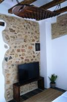 TV a/nebo společenská místnost v ubytování Elegante Apartamento frente al Puerto de Denia