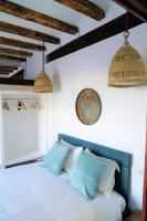 Postel nebo postele na pokoji v ubytování Elegante Apartamento frente al Puerto de Denia